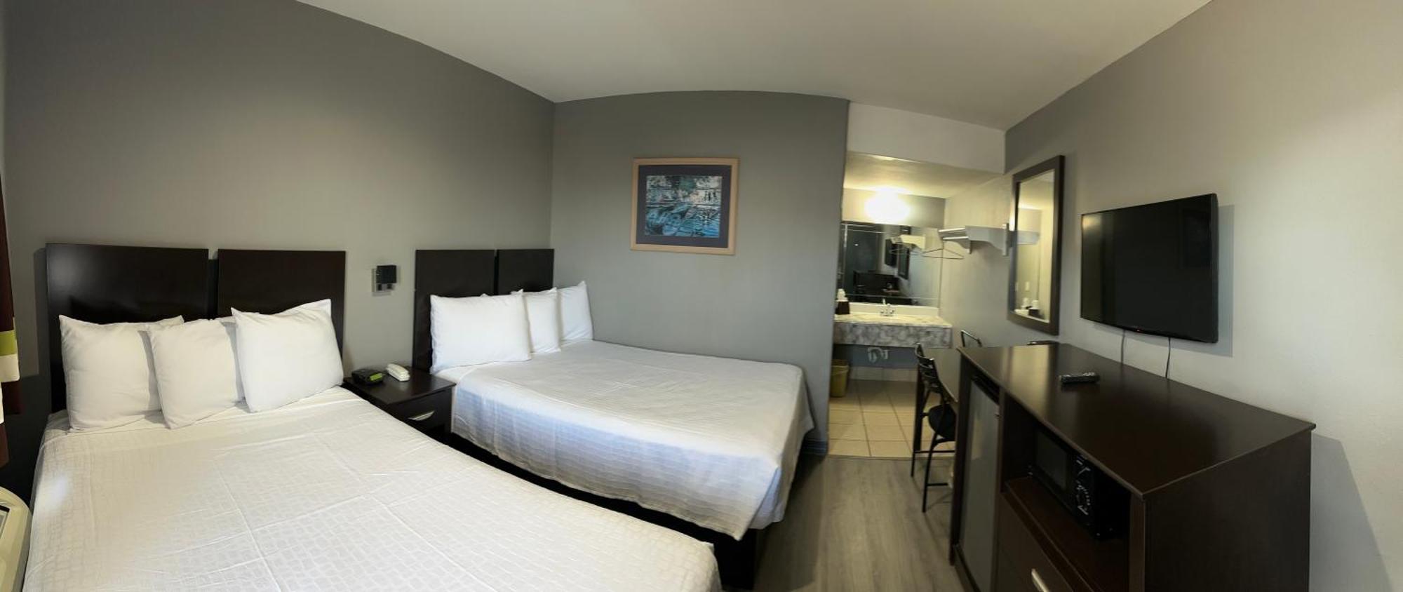 Americas Best Value Inn And Suites Groves Extérieur photo